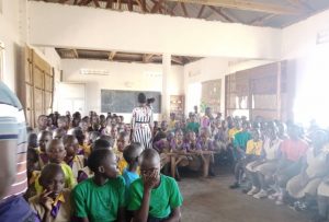 Leaders and students visiting Sagala Primary School as Ambassadors for Menstruation Health and Management 